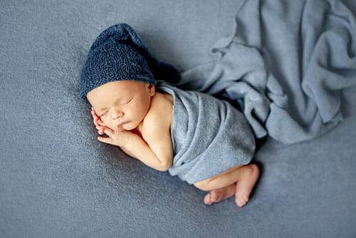 Cute sleeping newborn baby boy