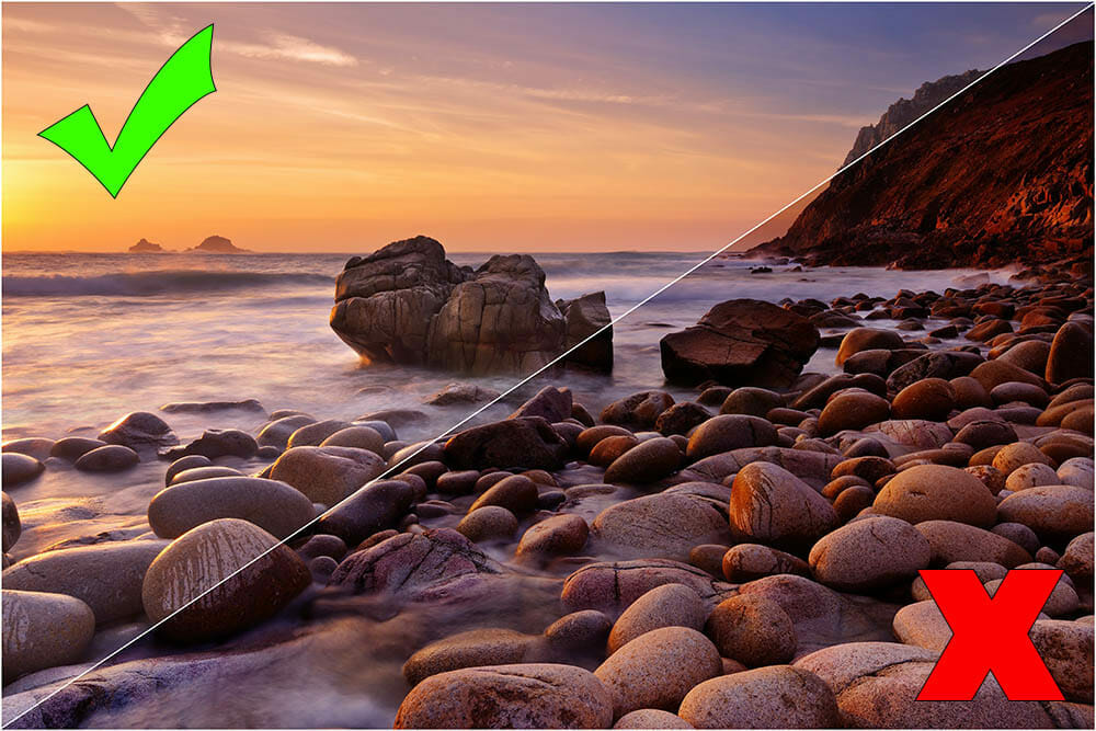 The beautiful rocky beach of Porth Nanven in Cornwall, England at sunset.